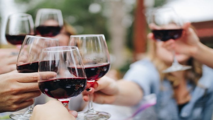 Women on a bachelorette weekend sampling wine.