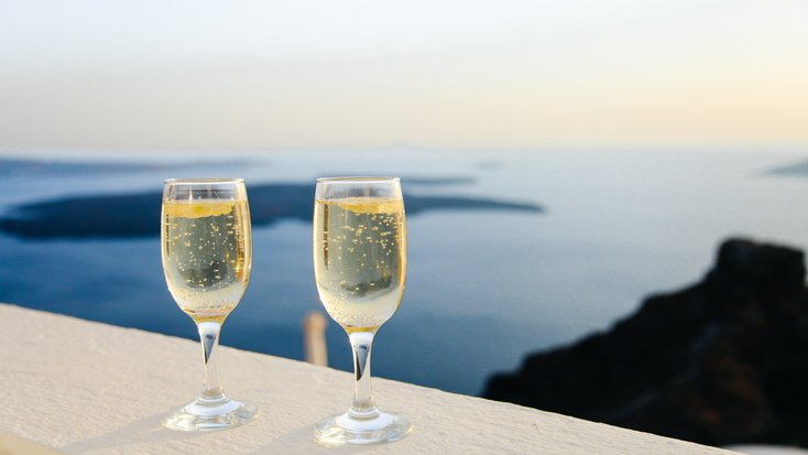 Two glasses of champagne at a destination wedding in Greece