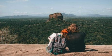 couple looking into distance during best gifts for people who love to travel experience