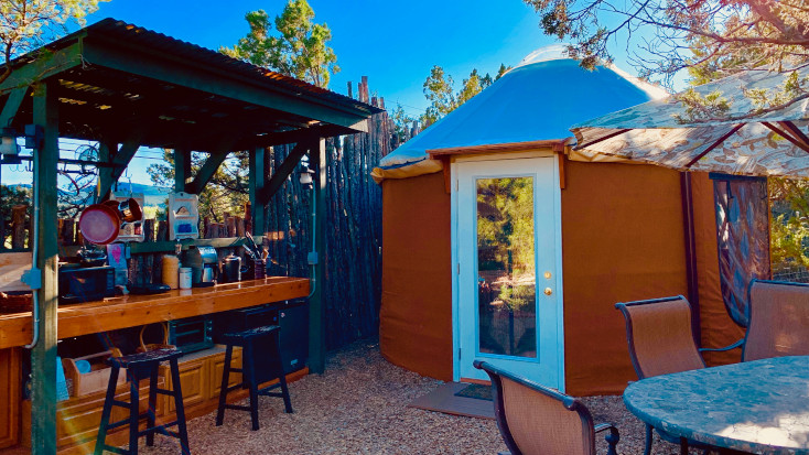 Yurt with outdoor kitchen and dining area in New Mexico