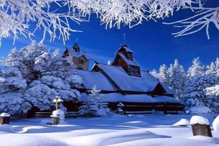 A rustic property in a snow covered forest, another one of the best gifts for boyfriends parents in 2020