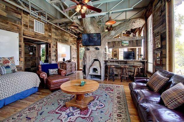 The living area of an Austin tree house rental, perfect for spring vacation ideas in  Texas.