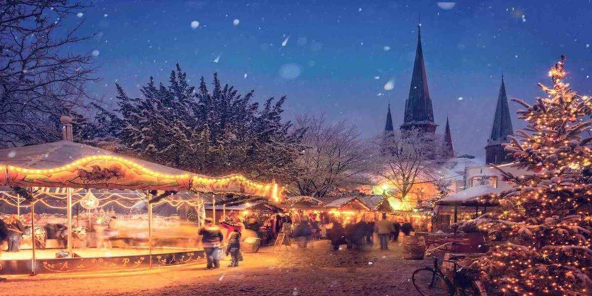 A Christmas market with a carousel