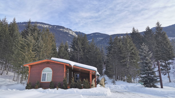 The cozy cabin is perfect when you are looking where to travel for winter, Banff Canada
