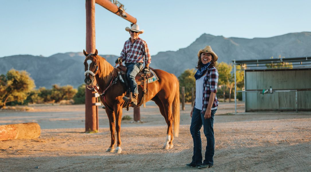 A photo of Rob and Sandi on their ranch.