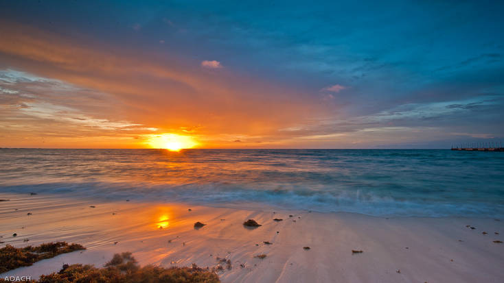 Spend spring break in Playa del Carmen and enjoy stunning sunset over the coastline