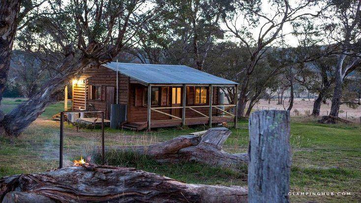 External view of camping Canberra rental with surrounding trees, perfect for Australia Day 2020. 