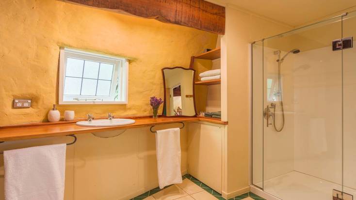 Stunning modern bathroom in the boot-shaped cabin