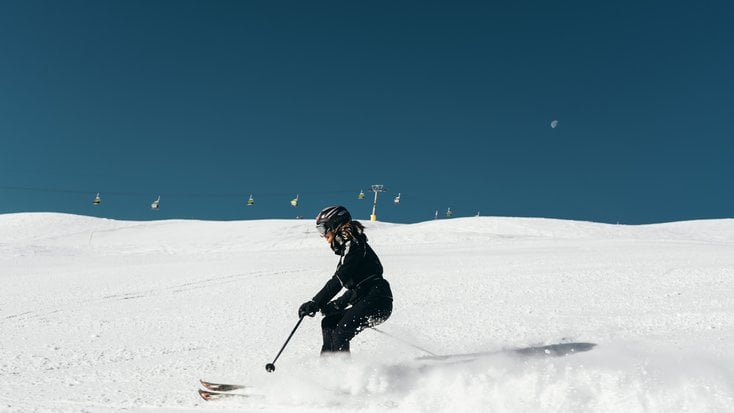 woman enjoys ruby mountain skiing with valentine, Nevada