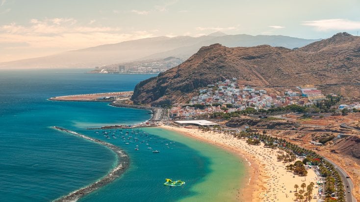 Honeymoon destinations showing a stunning beach in Tenerife, Spain 