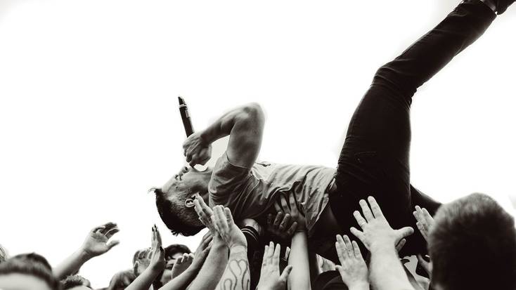 Head to some music festivals and catch sight of your favorite artists crowd surfing