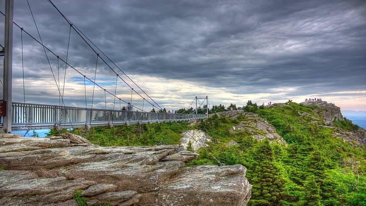 Cross the Mile High Swinging Bridge perfect family vacation activity