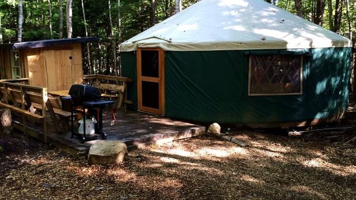 A rustic yurt in the woods near Portland, Maine