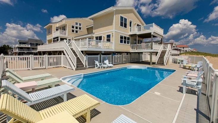 A luxury pool with a private pool overlooking Virginia Beach, beach house rentals