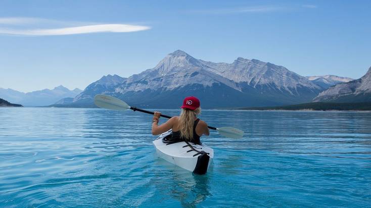 Girl enjoying traveling after using some of the best gifts for best friends 