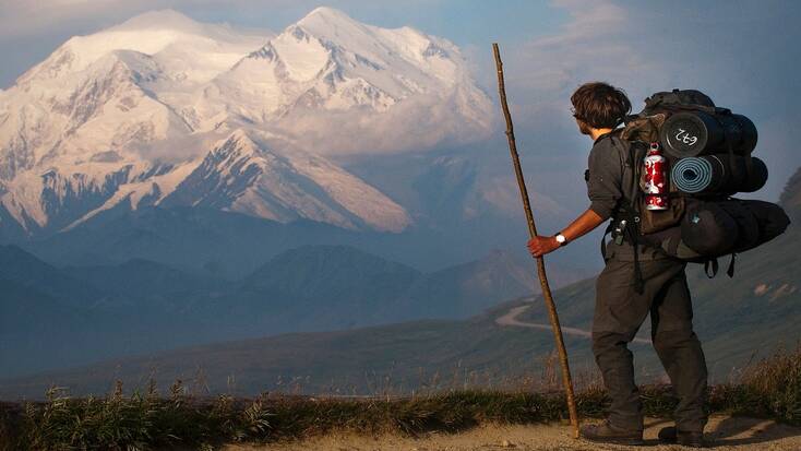 A traveler hiking in Alaska