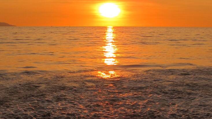 A sunset over the ocean in Puerto Vallarta