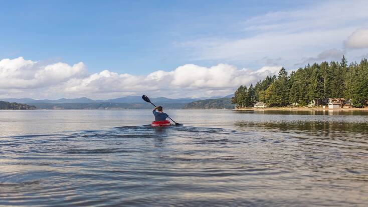 Visit local areas of natural beauty like a lake on your quick getaways