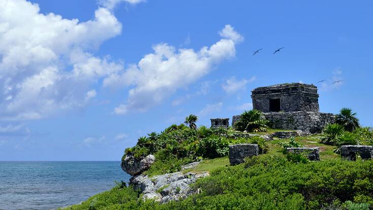 Mayan ruins overlooking the coast in Tulum, Mexico