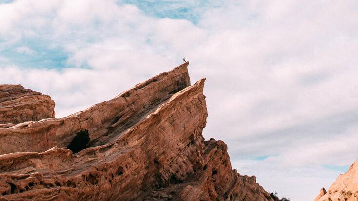 Someone standing at the top of Vasquez Rocks Natural Area Park