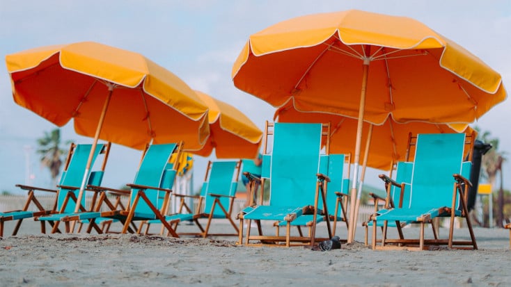 Best beach towns in Mississippi 2022: Umbrella beach day in Gulfport