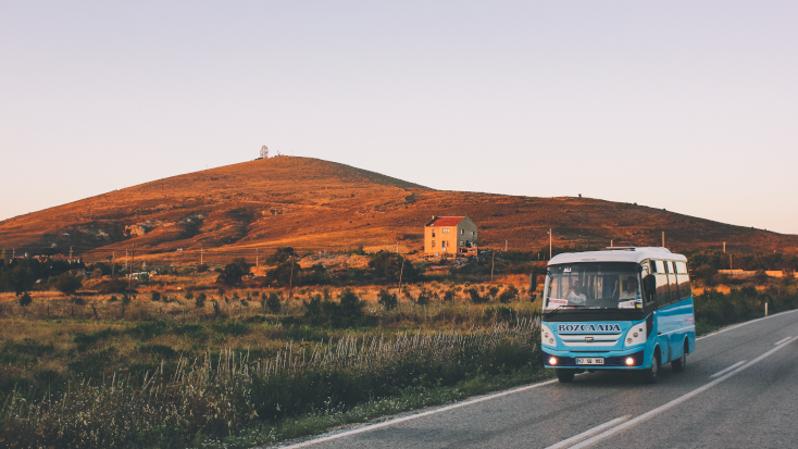 Catching a bus is always a great way to discover a new country when you go solo glamping