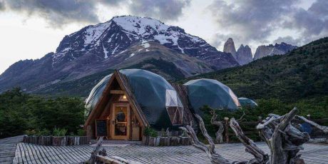 Glamping pods for a luxury camping vacation in the shadow of a mountain in Patagonia