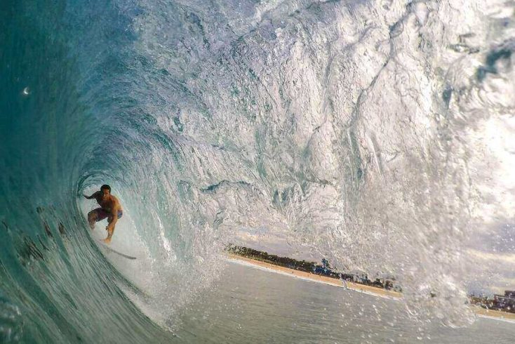 Someone surfing a tube in the West Coast, USA