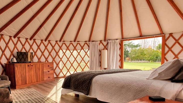 The interior of a stunning yurt for luxury camping