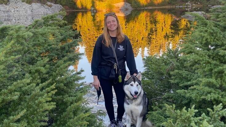 Katherine and her pup Slim while glamping in Masschusetts