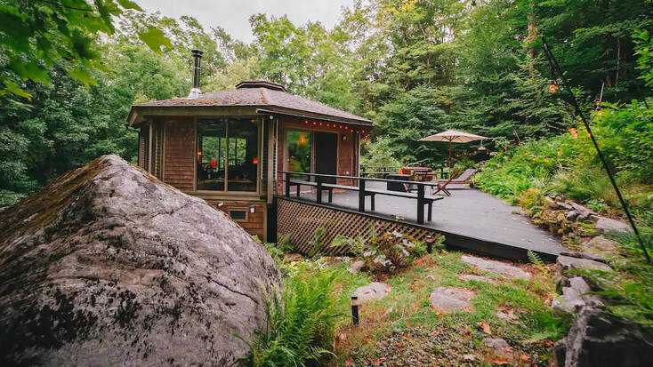 Enjoy Massachusetts glamping at this treehouse cabin!