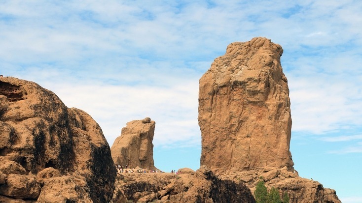 People exploring Roque Nublo in Gran Canaria