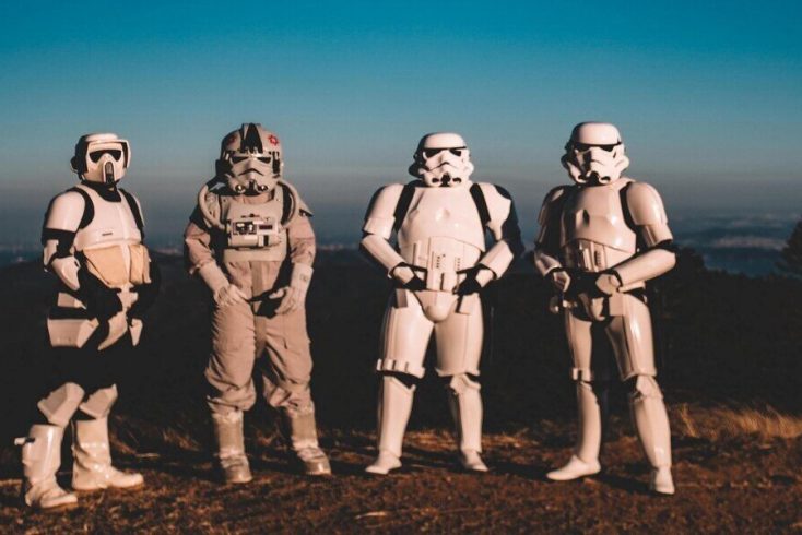 Four friends dressed in stormtrooper uniforms to celebrate Star Wars Day