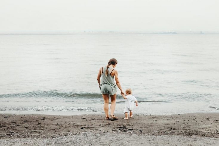 A mother and daughter paddling in the sea, one of our favorite things to do for mothers day