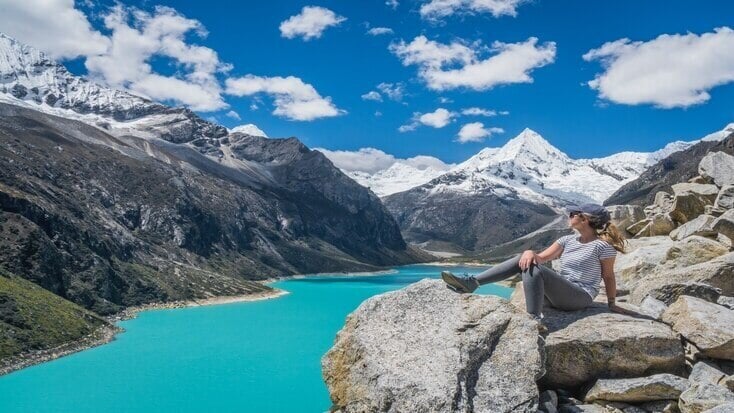 A woman looking at Lake Paron to celebrate International Day of Friendship 2023