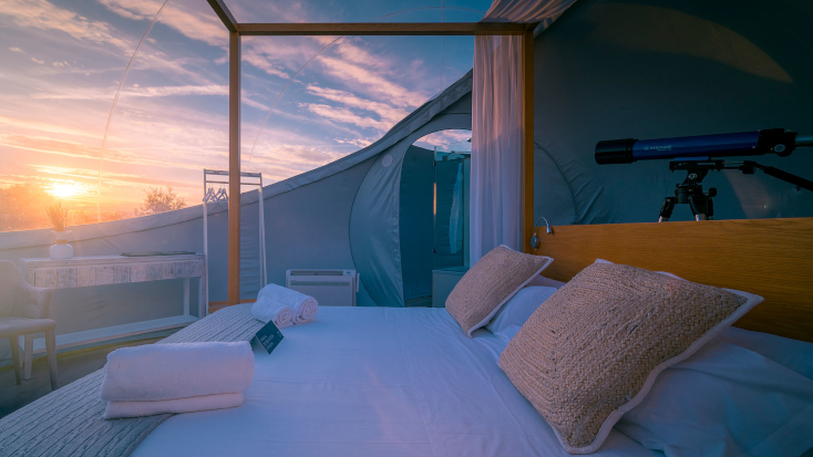 Glamping Hub’s Host of the Month for August 2021: Alejandro in Spain. Luxury camping bubble dome in Spain.