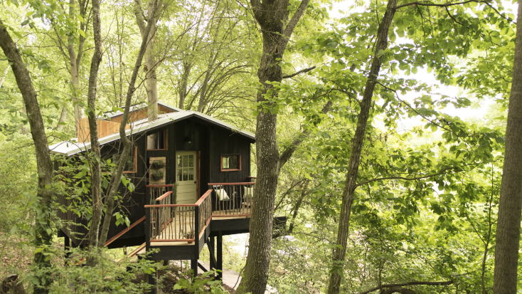 Cabins in the woods and tree houses are perfect for Halloween glamping