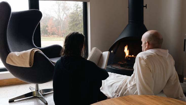 Cozy fireplace - Luxury cabin in Arkansas. Winners of Glamping Hub's Host of the Month for May 2022