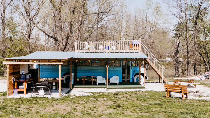 Unique blue bus  perfect for group glamping in Missouri. 