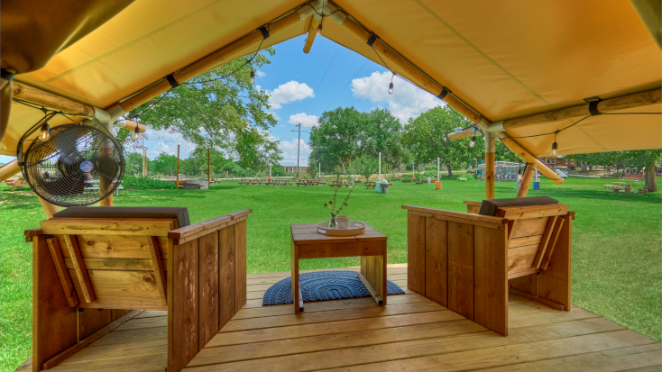 Sip on Wildflyer Mead on your private deck for a luxurious glamping experience in Navasota, Texas