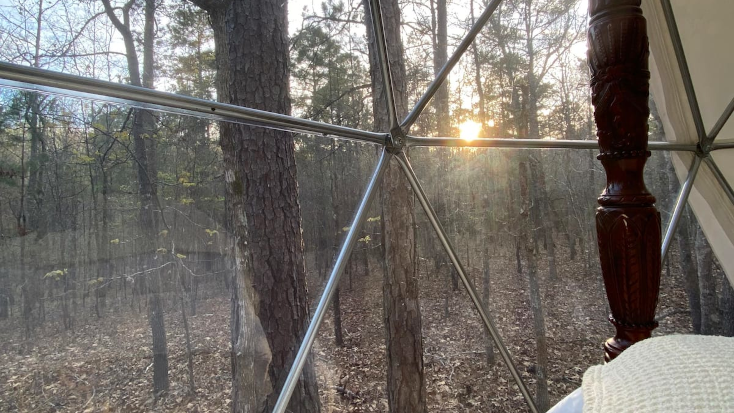 Relax as you soak in the forest views on your next glamping weekend escape in Georgia