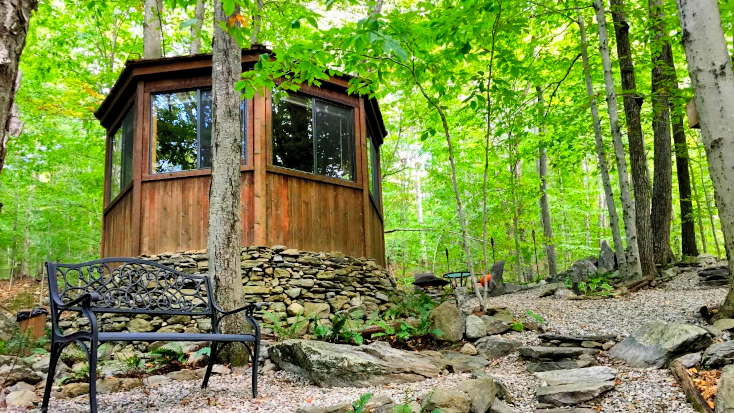 Host of the Month for December 2022. Unique octagonal tiny house in the forest of Connecticut