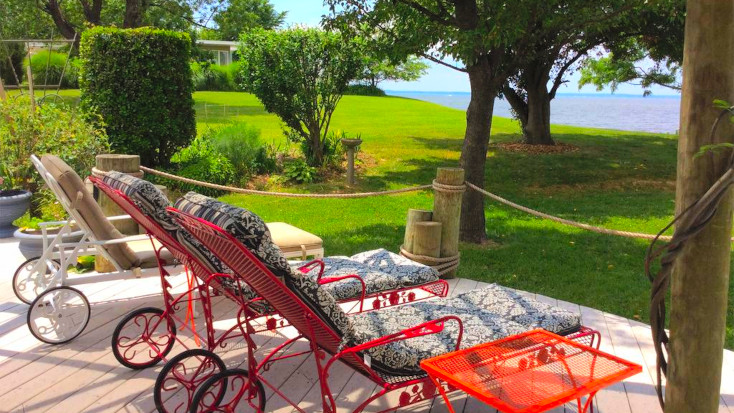 deckchairs with lake view at cottage rental in Maryland