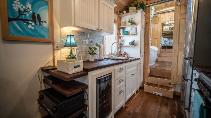 Enjoy a full kitchen in this tiny house at Denise and Tom's glmaping site